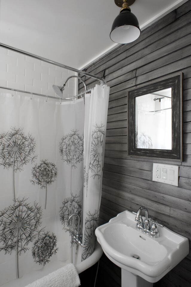 vintage bath grey wood paneling clawfoot tub